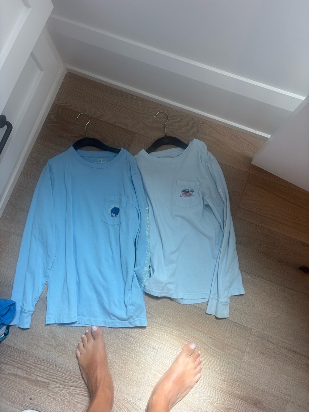 Two hockey vineyard Vine tshirts